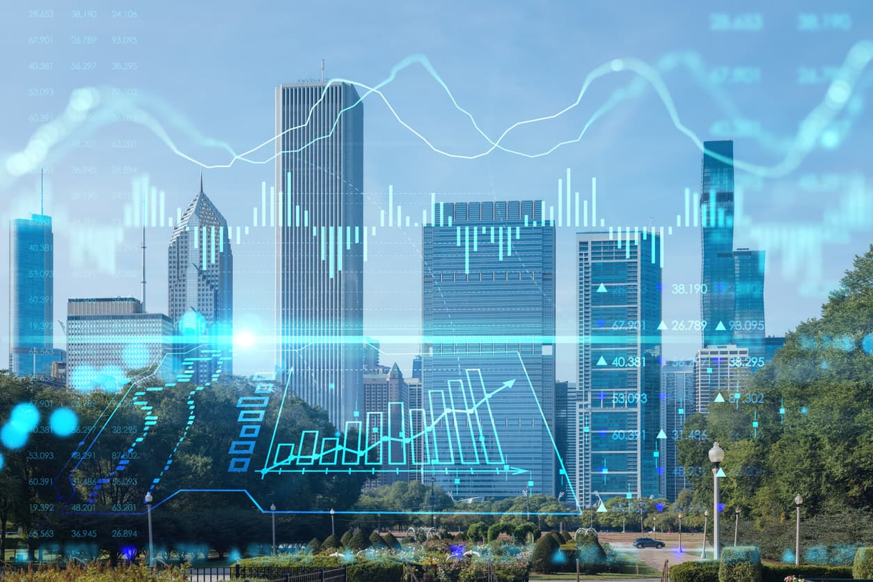 Skyline eines Finanzdistrikts mit einem darüberliegenden Hologramm-Diagramm, das eine Gewerbeimmobilientransaktion veranschaulicht