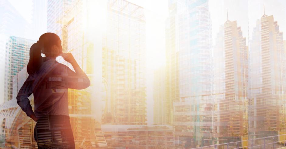 A woman looking out the window contemplating the latest real estate shifts